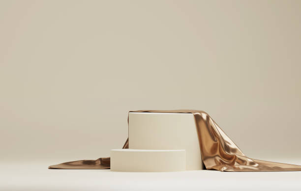 istock Round podium base with gold silk on luxury white abstract background 1446384581
