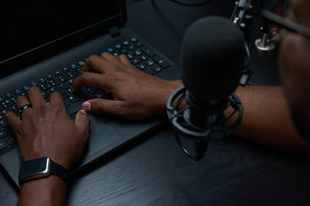 istock Black male blogger blogger posts content in his studio 1446387074