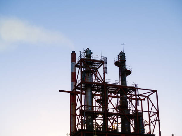 istock Industrial silhouette at sunrise 1446391733