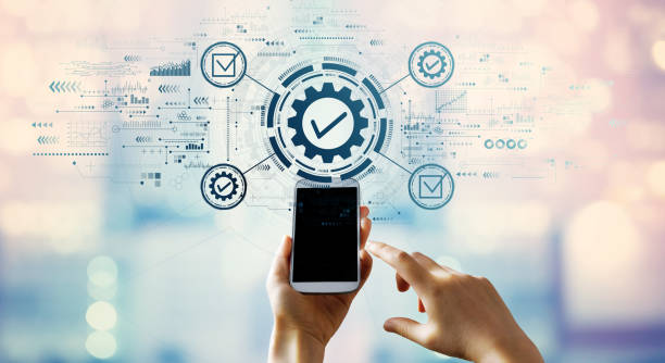 istock Quality control approval with hand pressing a smartphone 1446394707