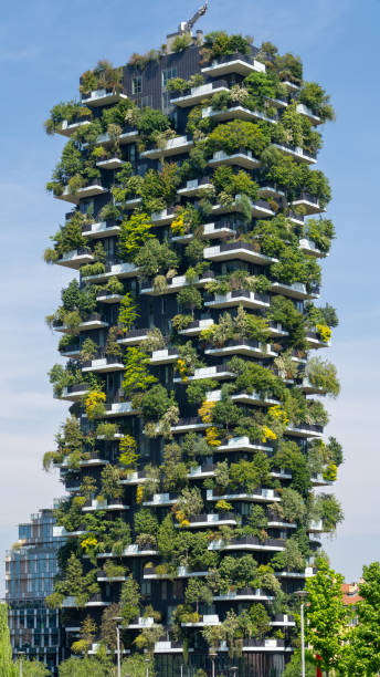 Milano, Italy. Bosco Verticale. Amazing view at the modern and ecological skyscraper with many trees on each balcony. Modern architecture, vertical gardens, terraces with plants stock photo
