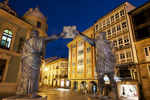 Lugo, Spain- July 26, 2011:  Monument, sculpture to Paullus Fabius Maximus and Caesar Augustus, founders of Lucus Augusti. Lugo city, Galicia, Spain.