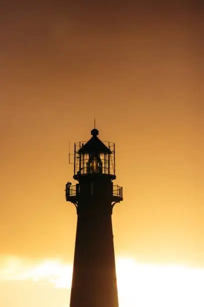 A vertical shot of the Andenes Lighthouse in Noway at sunset