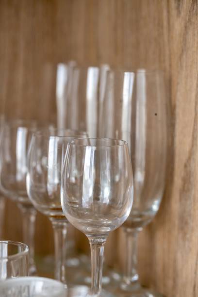 istock Empty clean wine and champagne glasses on the shelf 1446411152