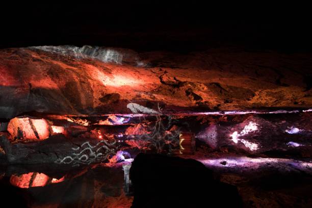istock Beautiful view of a cave with lightning at night 1446411257