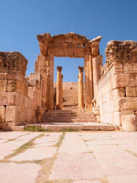 istock Historical archaeological site with gate and columns, ancient Roman structure in Jerash, Jordan. 1446412380