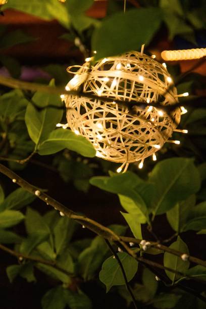 istock Vertical shot of a Christmas ball decoration hangs on a tree 1446412493