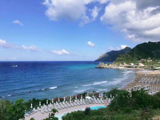 istock Beautiful beach with chairs on a sunny morning 1446413077