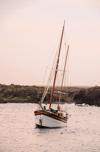 Vintage Sail Boat Wooden Vesessel in the Ocean