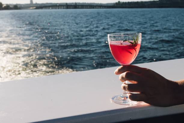 istock pink cocktail drink on deck of boat 1446413855