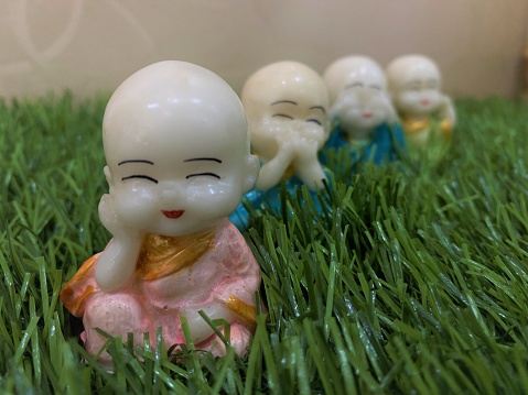 cute miniature buddha closeup shots