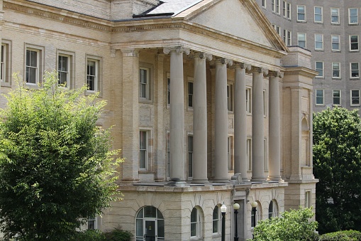 Denver, Colorado, USA: Denver City and County Building - portico and curved wings with colonnades of Ionic columns -  Beaux-Arts Neoclassical style, Allied Architects, Robert K. Fuller and Associated Architects - Bannock Street and Civic Center Park.