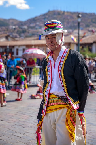 Cusco, Peru – June 10, 2019: A colorfully dressed Peruvian man during a religious ceremony of Inti Raymi