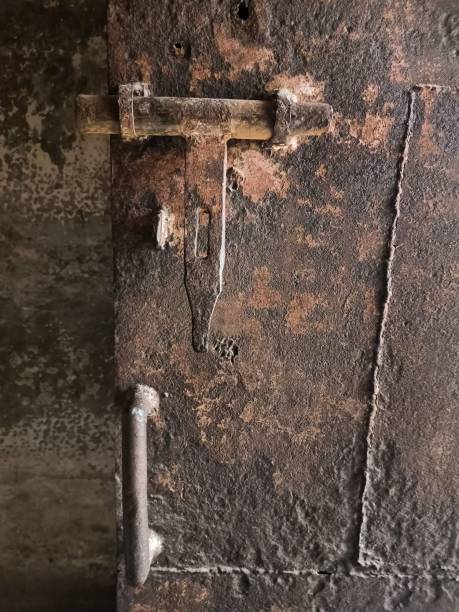istock Vertical shot of a rusty metal door lock 1446418290