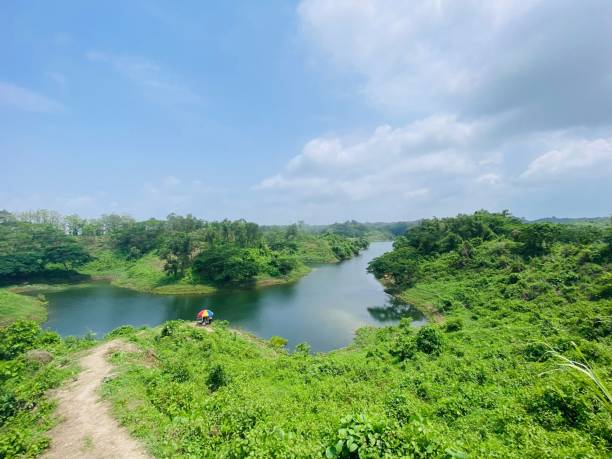 istock Beautiful lake in green hills 1446418806