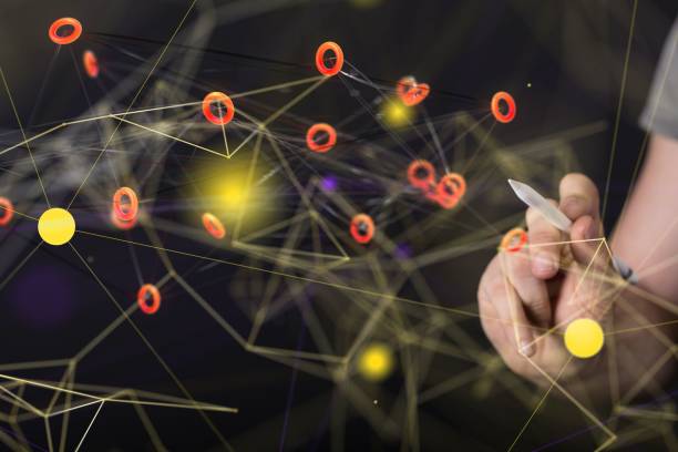 istock Businessman presenting a 3D rendered hologram of a network in a cyberspace 1446418977