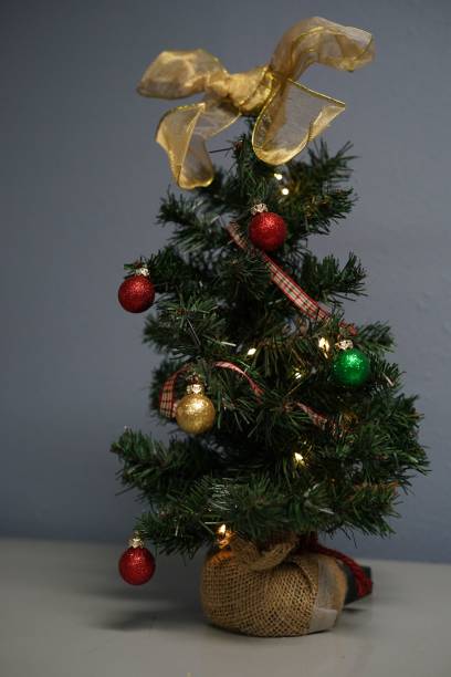 istock Vertical shot of a small decorative Christmas tree 1446419310