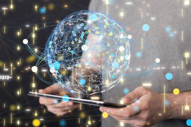 istock Hands holding a tablet with a hovering sphere. Concept of global network, blockchain. 1446419714