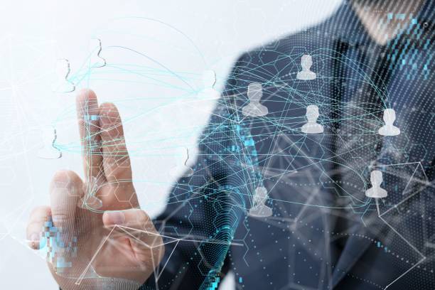 istock Man's hand  pointing at 3D rendered profile icons 1446419979