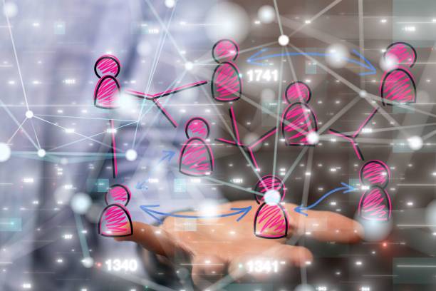 istock Group of 3D rendered profile icons hovering over a man's hand 1446420035