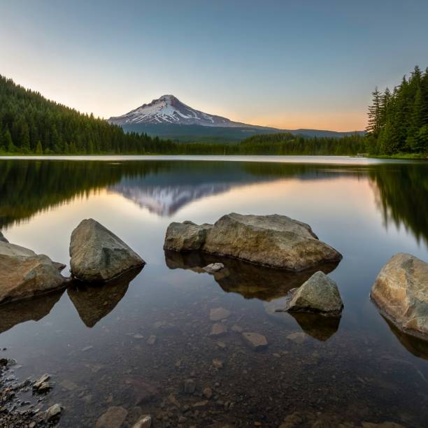 istock Calm Trillium lake view reflecting trees and clear sky background 1446421340