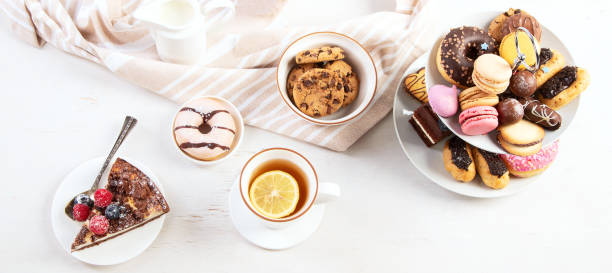 istock Afternoon tea stand with sweet treats. 1446421523