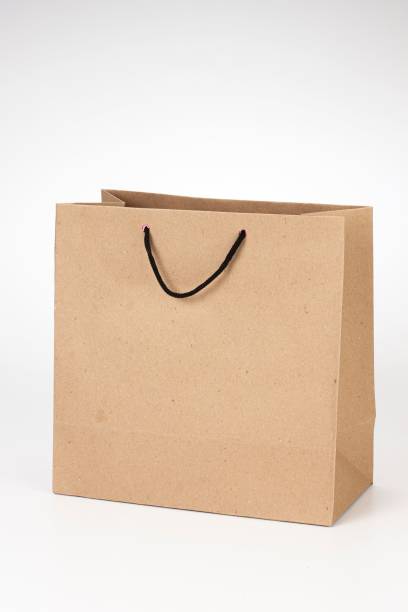 istock Eco paper bag on white background 1446421706