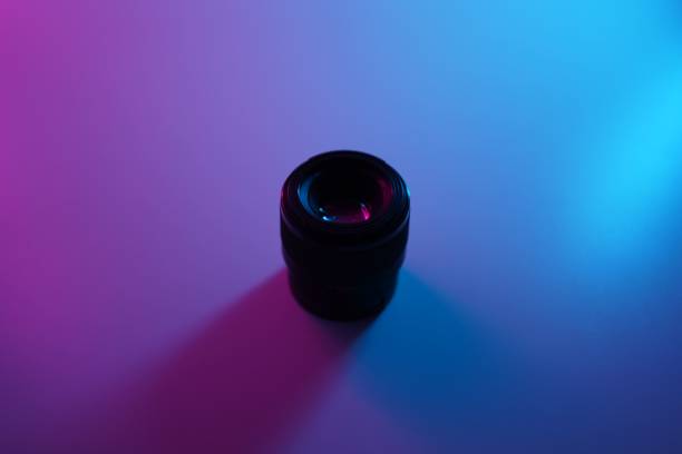 istock Sony 50mm 1.8 lens with pink and blue lights. 1446422749