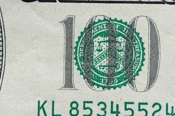istock Closeup of a 100 American dollar banknote 1446424351