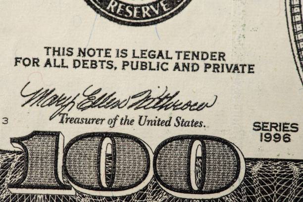 istock Closeup of a 100 American dollar banknote 1446424971