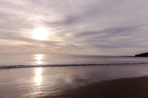 istock Sun Setting on Atlantic Ocean in Tenerife Canary Island Spain 1446425985