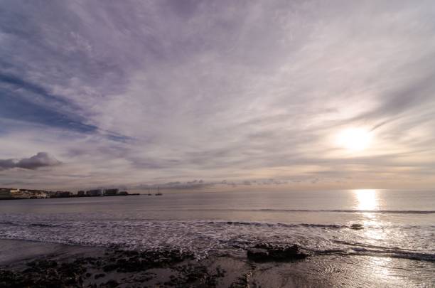 istock Sun Setting on Atlantic Ocean in Tenerife Canary Island Spain 1446426062