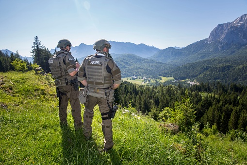 GarmischPartenkirchen, Germany – June 07, 2015: A unit of the special forces of the German police monitoring the area around G7 Summit at castle Elmau