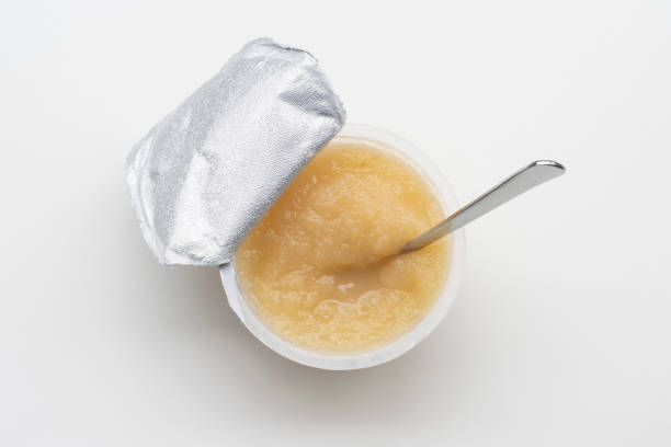 Cup of Unsweetened Applesauce stock photo