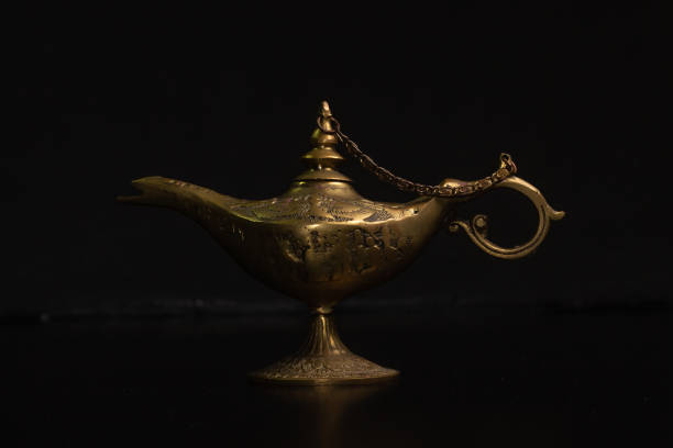 istock Aladdin's magic lamp isolated on black background 1446434358