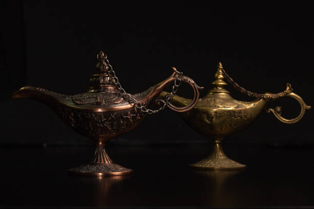 istock Aladdin's magic lamp isolated on black background 1446434362