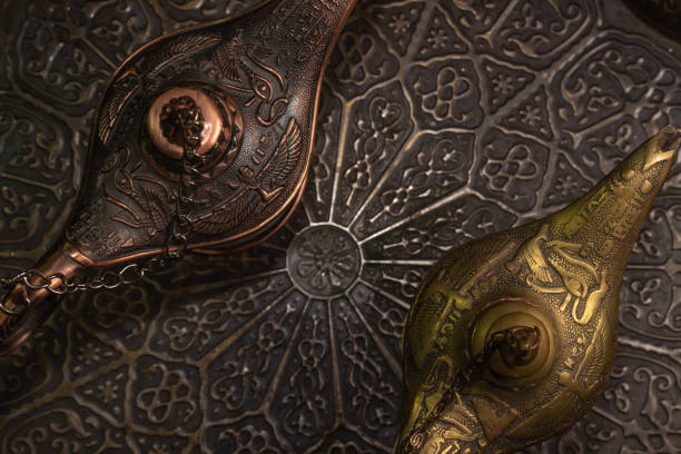 istock Aladdin's magic lamp isolated on black background 1446434372