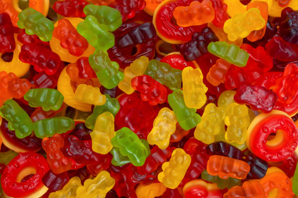 istock Assorted colorful gummy candies. Jelly donuts. Jelly bears. 1446436270