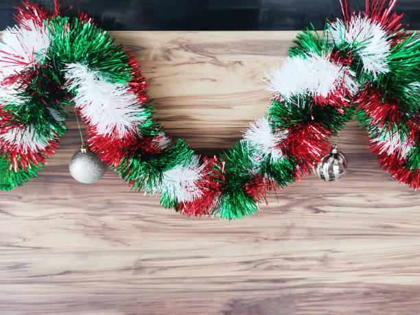 istock christmas wreath on wooden background 1446438732