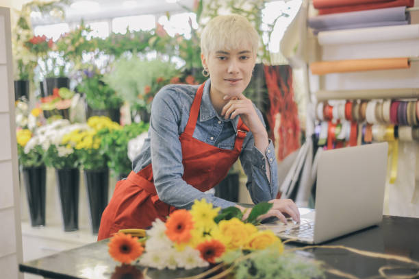 istock Female flower shop owner 1446444063