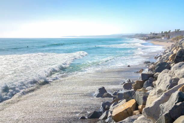 istock San Clemente beach in California with rocks on the shore 1446446694