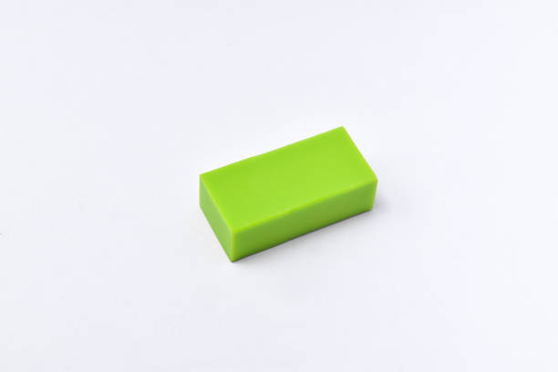istock Green eraser isolated on white background 1446447767