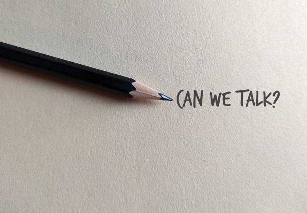 pencil on copy space craft paper with text written can we talk?, concept of boss , manager, partners or friends approach to have a serious talk or difficult conversation to solve conflicts or relationship issues - toughness imagens e fotografias de stock