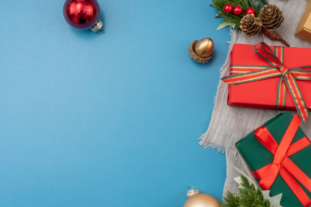 istock Christmas composition. festive decor on blue background. Copy space, flat lay, top view. 1446452285