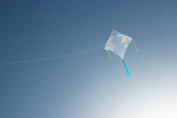 istock A kite floating in the sky. 1446453188