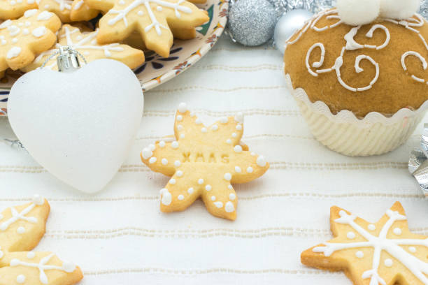 istock Snowflake-shaped sugar icing Christmas cookie with the message 