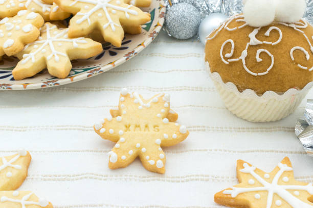 istock Snowflake-shaped sugar icing Christmas cookie with the message 