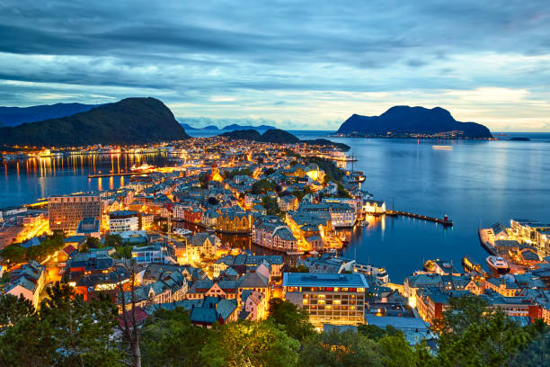 Alesund port town Alesund port town from the top at dusk, Norway geirangerfjord stock pictures, royalty-free photos & images