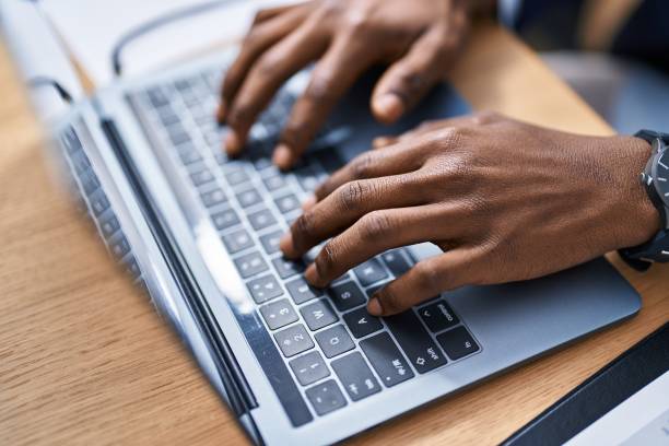 istock African american man business worker using laptop working at office 1446459500