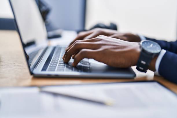 istock African american man business worker using laptop working at office 1446459503